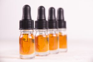 cannabis oil bottles with THC and CBD